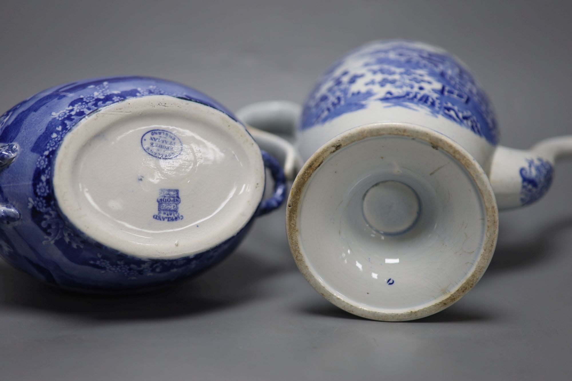 A Staffordshire pearlware blue and white pottery coffee pot and a Copeland Spode pilgrim flask, tallest 31cm